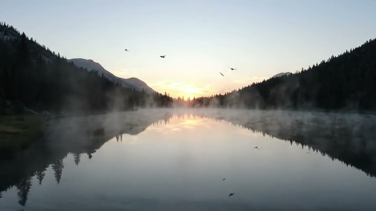 The original six-second clip of a misty mountain lake at sunrise