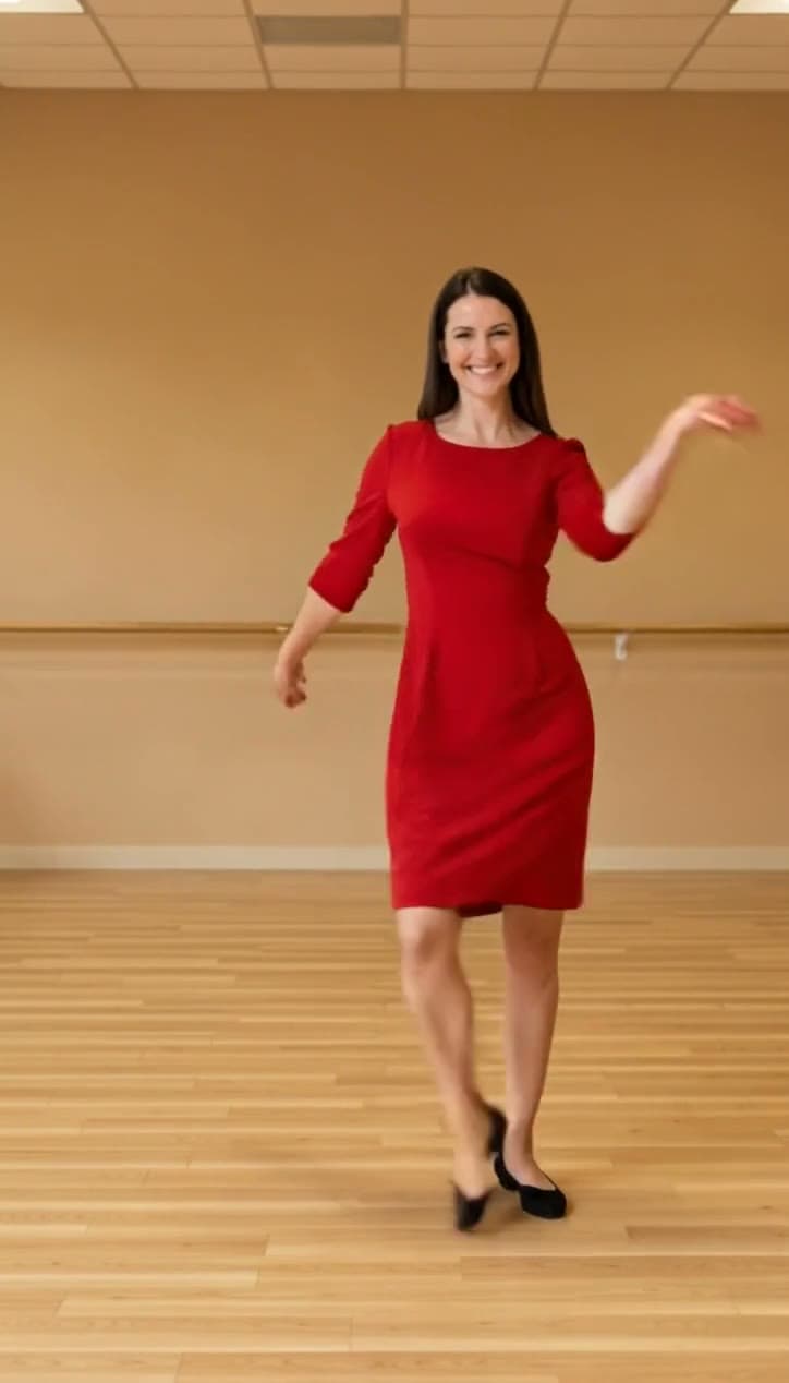 The original clip of a woman in a red dress dancing salsa in a bright studio